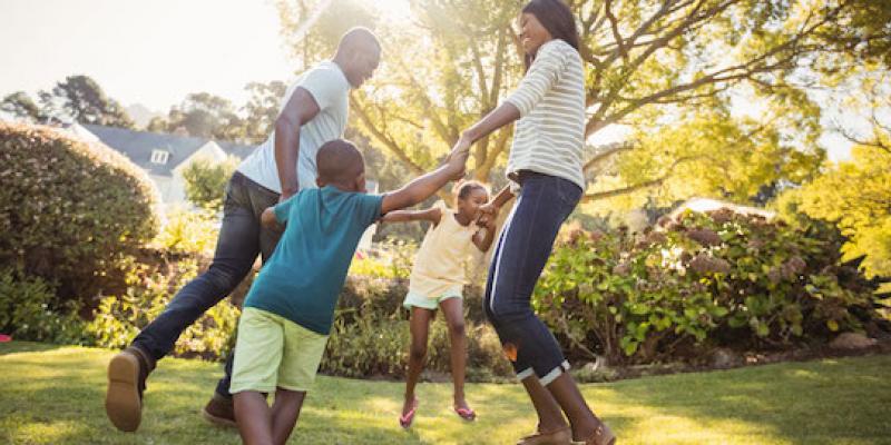 family outside playing